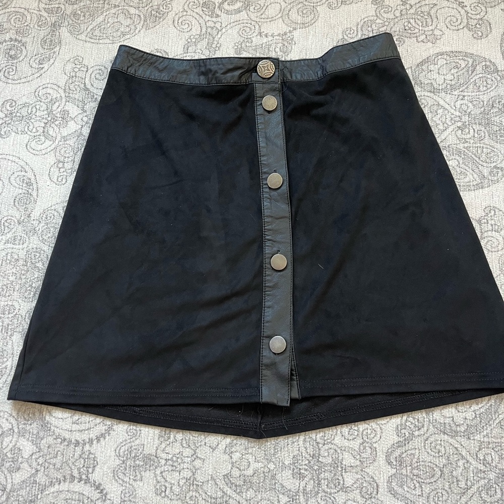 Black leather mini skirt